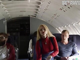 Stewardess gets it on with a passenger in the restroom of the plane