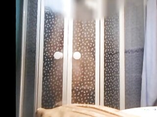 Hidden cam captures steamy showering session with a naughty housekeeper