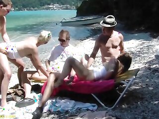 Caucasian hotties have a wild beach orgy with facial finish