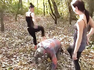Amateur femdom threesome in the woods with an obedient slave
